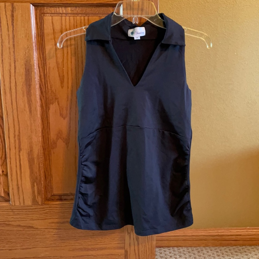 Smashing women’s golf shirt. Size M